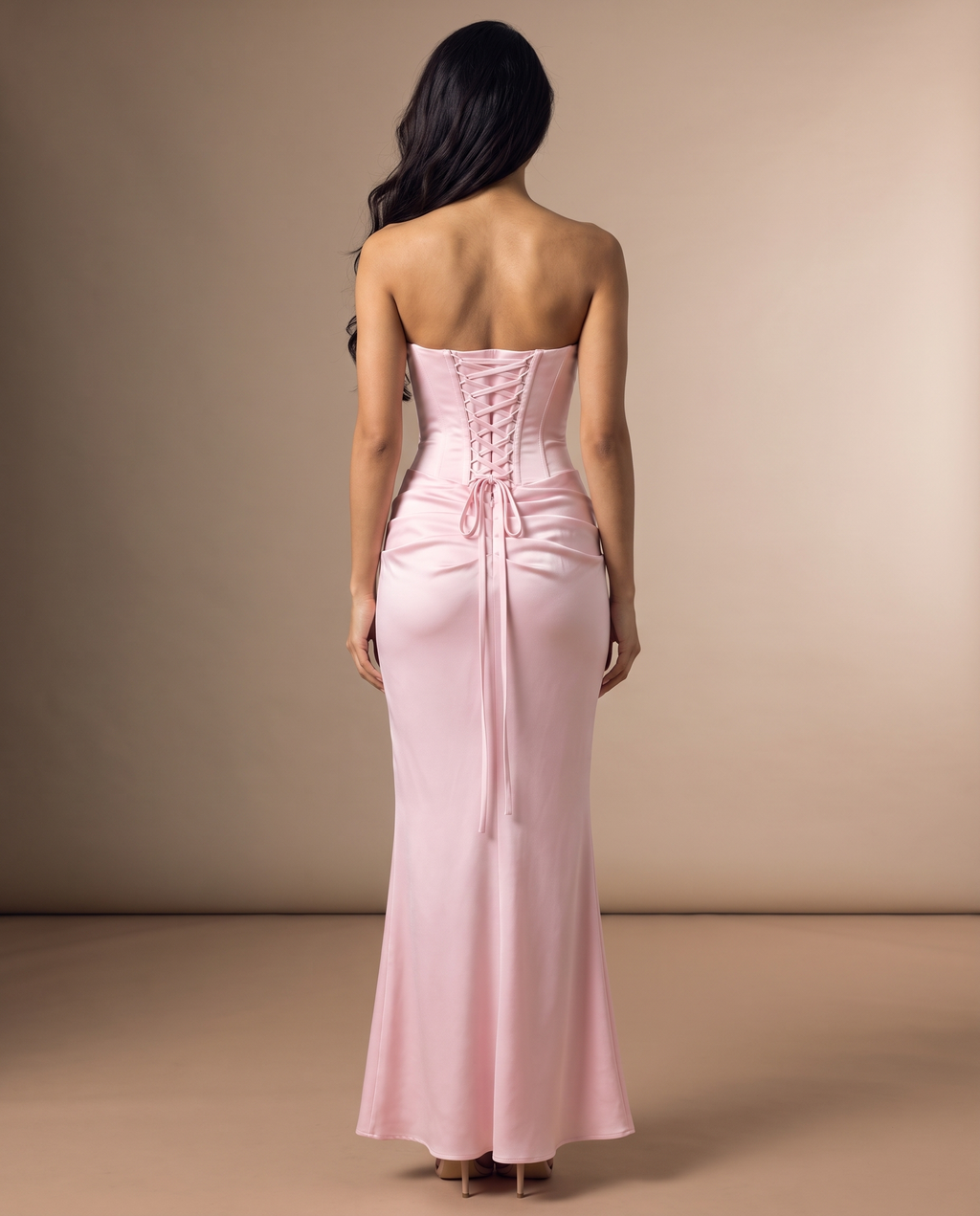 Valentina strapless corset-back satin gown in pink, back view with corset lacing – Belle Marisol